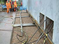 Half way there! The building has left the old base on its way to the new base.  Shown are the LV cable, bonding and control cables which were left unconnected